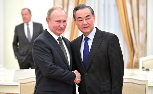 普京会见王毅 祝贺普京连任总统并期待两国关系更进一步