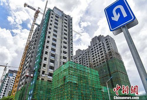 资料图。 在建的楼盘。<a target='_blank'  data-cke-saved-href='http://www.chinanews.com/' href='http://www.chinanews.com/'>中新社</a>记者 骆云飞 摄
