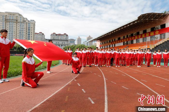 队伍将由黑龙江省体育局田径中心配合中国铁人三项运动协会实施管理 吕品 摄